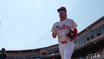Mar 8, 2025; Clearwater, Florida, USA; Philadelphia Phillies second baseman Bryson Stott (5) takes the field for a game against the Toronto Blue Jays during spring training at BayCare Ballpark.