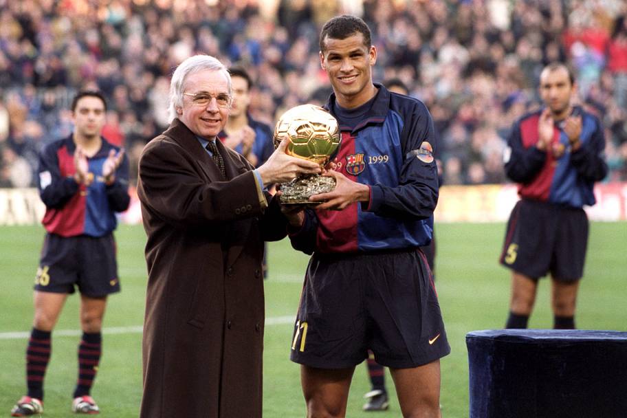 Rivaldo showing off his prize.