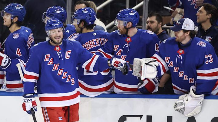 Mar 31, 2026; New York, New York, USA;  New York Rangers center J.T. Miller (8) celebrates with his teammates after scoring a goal in the first period against the New Jersey Devils at Madison Square Garden. Mandatory Credit: Wendell Cruz-Imagn Images