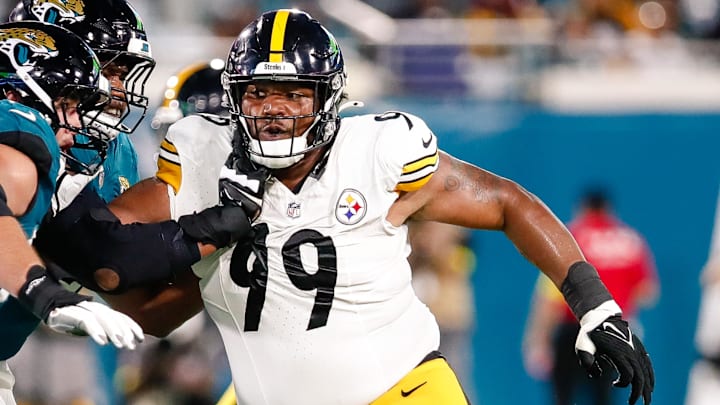 Aug 9, 2025; Jacksonville, Florida, USA; Pittsburgh Steelers defensive tackle Derrick Harmon (99) rushes the passer against the Jacksonville Jaguars during a preseason game at EverBank Stadium. Mandatory Credit: Travis Register-Imagn Images Aug 9, 2025; Jacksonville, Florida, USA; Pittsburgh Steelers defensive tackle Derrick Harmon (99) rushes the passer against the Jacksonville Jaguars during a preseason game at EverBank Stadium. Mandatory Credit: Travis Register-Imagn Images