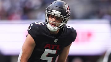 Nov 16, 2025; Atlanta, Georgia, USA; Atlanta Falcons wide receiver Drake London (5) looks on before the start of a play against the Carolina Panthers in the second quarter at Mercedes-Benz Stadium.