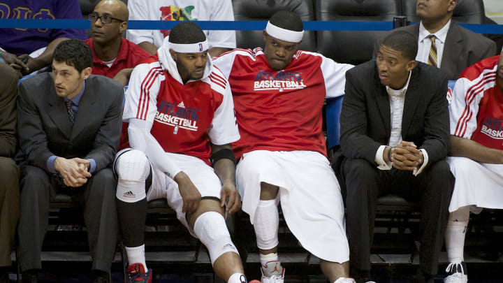 May 12, 2011; Atlanta, GA, USA;  Atlanta Hawks power forward Josh Smith (left) and shooting guard Joe Johnson (right) watch as the final seconds tick off the clock against the Chicago Bulls during the second half of game six of the conference semi finals at Philips Arena. The Bulls defeated the Hawks 93-73 to win the series four games to two. Mandatory Credit: Dale Zanine-USA TODAY Sports