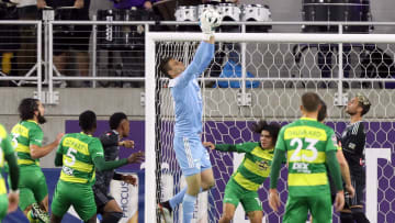 Louisville City FC goalie Ben Lindt (39) makes the save under pressure from Tampa Bay Rowdies'