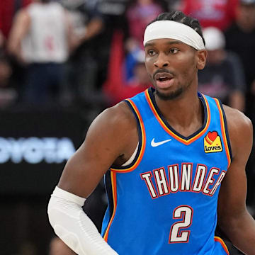 Nov 4, 2025; Inglewood, California, USA; Oklahoma City Thunder guard Shai Gilgeous-Alexander (2) dribbles the ball against the LA Clippers in the second half at Intuit Dome. Mandatory Credit: Kirby Lee-Imagn Images