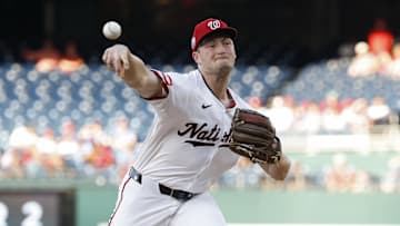 Aug 14, 2025; Washington, District of Columbia, USA; Washington Nationals starting pitcher Brad Lord (61) pitches against the Philadelphia Phillies during the first inning at Nationals Park. 