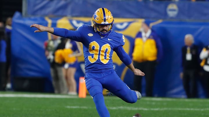 Nov 16, 2023; Pittsburgh, Pennsylvania, USA;  Pittsburgh Panthers place kicker Ben Sauls (90) kicks off to the Boston College Eagles during the second quarter at Acrisure Stadium. Mandatory Credit: Charles LeClaire-Imagn Images