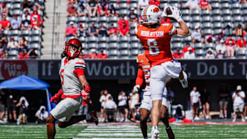Oct 4, 2025; Tucson, Arizona, USA; Oklahoma State safety Parker Robertson (8) intercepts a pass intended for Arizona Wildcats wide receiver Gil Richardson (5) during the second quarter at Arizona Stadium. Mandatory Credit: Aryanna Frank-Imagn Images
