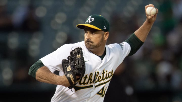 Jun 5, 2024; Oakland, California, USA; Oakland Athletics pitcher T.J. McFarland (48) delivers a pitch against the Seattle Mariners during the seventh inning at Oakland-Alameda County Coliseum. 