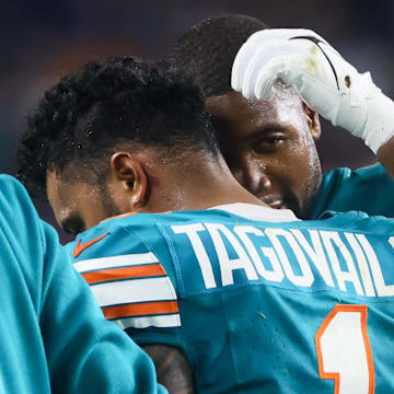 Sep 12, 2024; Miami Gardens, Florida, USA; Miami Dolphins quarterback Tua Tagovailoa (1) walks off the field after an apparent injury against the Buffalo Bills during the third quarter at Hard Rock Stadium.