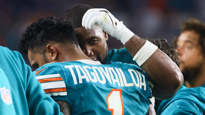 Sep 12, 2024; Miami Gardens, Florida, USA; Miami Dolphins quarterback Tua Tagovailoa (1) walks off the field after an apparent injury against the Buffalo Bills during the third quarter at Hard Rock Stadium.