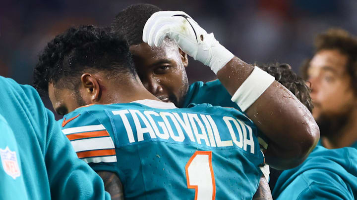 Sep 12, 2024; Miami Gardens, Florida, USA; Miami Dolphins quarterback Tua Tagovailoa (1) walks off the field after an apparent injury against the Buffalo Bills during the third quarter at Hard Rock Stadium. Mandatory Credit: Sam Navarro-Imagn Images