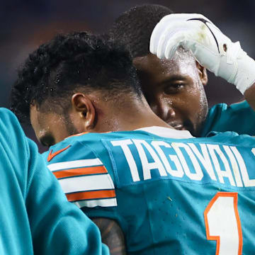 Miami Dolphins quarterback Tua Tagovailoa (1) walks off the field after his concussion against the Buffalo Bills during the third quarter at Hard Rock Stadium on Thursday night.