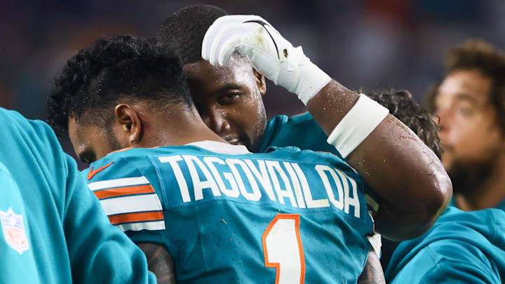 Miami Dolphins quarterback Tua Tagovailoa (1) walks off the field after his concussion against the Buffalo Bills during the third quarter at Hard Rock Stadium on Thursday night.