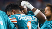 Sep 12, 2024; Miami Gardens, Florida, USA; Miami Dolphins quarterback Tua Tagovailoa (1) walks off the field after an apparent injury against the Buffalo Bills during the third quarter at Hard Rock Stadium. Mandatory Credit: Sam Navarro-Imagn Images