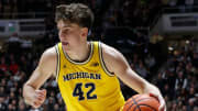 Michigan Wolverines forward Will Tschetter (42) drives to the basket against the Purdue Boilermakers at Mackey Arena in West Lafayette, Indiana, on Tuesday, Jan. 23, 2024.