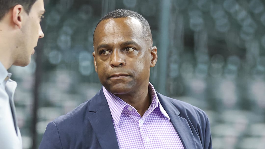 Aug 31, 2024; Houston, Texas, USA; Houston Astros general manager Dana Brown (right) talks before the game against the Kansas City Royals at Minute Maid Park. 