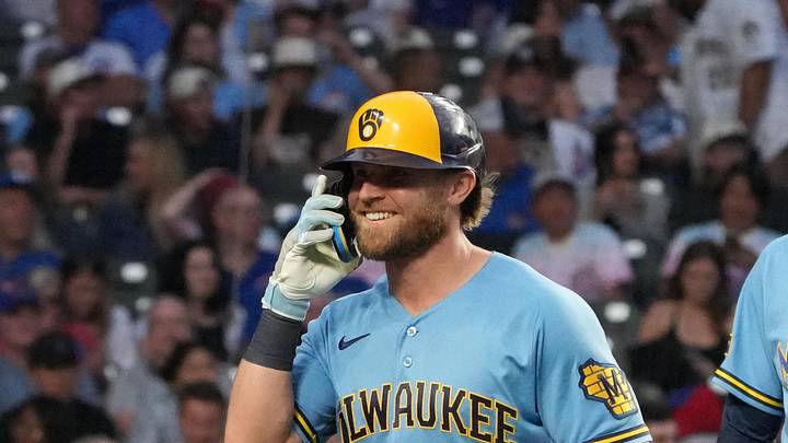May 18, 2026; Chicago, Illinois, USA; Milwaukee Brewers left fielder Jake Bauers (9) is greeted by designated hitter Christian Yelich (22) after hitting a three-run home run against the Chicago Cubs during the fifth inning at Wrigley Field. Mandatory Credit: David Banks-Imagn Images