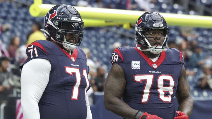 Oct 15, 2023; Houston, Texas, USA; Houston Texans offensive tackle Tytus Howard (71) and offensive tackle Laremy Tunsil (78) warm up before the game against the New Orleans Saints at NRG Stadium. Mandatory Credit: Troy Taormina-USA TODAY Sports