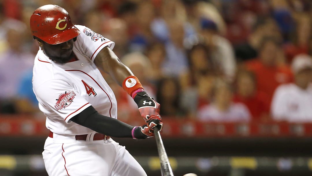 Cincinnati Reds second baseman Brandon Phillips (4) singles in the bottom of the fifth inning against the New York Mets on Sept. 24, 2015, at Great American Ball Park.