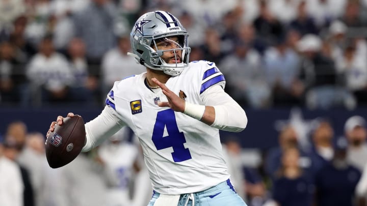 Jan 14, 2024; Arlington, Texas, USA; Dallas Cowboys quarterback Dak Prescott (4) drops back to pass against the Green Bay Packers in the first half of the 2024 NFC wild card game at AT&T Stadium. Mandatory Credit: Kevin Jairaj-USA TODAY Sports