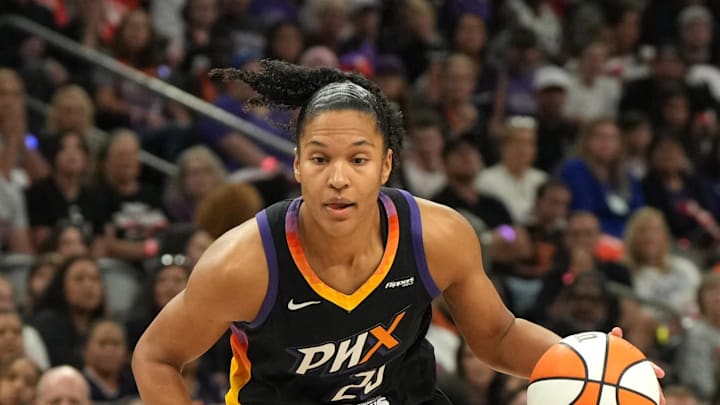 Sep 28, 2025; Phoenix, Arizona, USA; Phoenix Mercury forward Alyssa Thomas (25) drives against the Minnesota Lynx in the first half during game four of the second round for the 2025 WNBA Playoffs at PHX Arena. Mandatory Credit: Rick Scuteri-Imagn Images