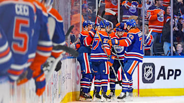 The Edmonton Oilers celebrate a goal scored 