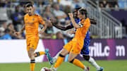 Aug 6, 2024; Charlotte, NC, USA; Real Madrid midfielder Luka Modric (10) tries to maintain control of the ball against Chelsea during the second half at Bank of America Stadium. Mandatory Credit: Jim Dedmon-Imagn Images