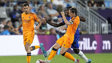 Aug 6, 2024; Charlotte, NC, USA; Real Madrid midfielder Luka Modric (10) tries to maintain control of the ball against Chelsea during the second half at Bank of America Stadium. Mandatory Credit: Jim Dedmon-Imagn Images
