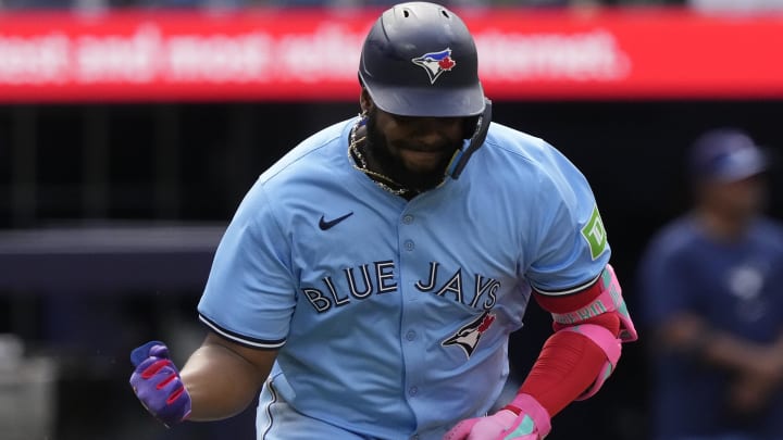 Aug 24, 2024; Toronto, Ontario, CAN; Toronto Blue Jays first baseman Vladimir Guerrero Jr. (27) reacts after hitting a fly ball to the Los Angeles Angels during the  third inning at Rogers Centre. Mandatory Credit: John E. Sokolowski-USA TODAY Sports