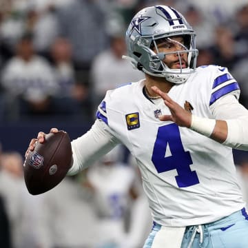 Jan 14, 2024; Arlington, Texas, USA; Dallas Cowboys quarterback Dak Prescott (4) drops back to pass against the Green Bay Packers in the first half of the 2024 NFC wild card game at AT&T Stadium.