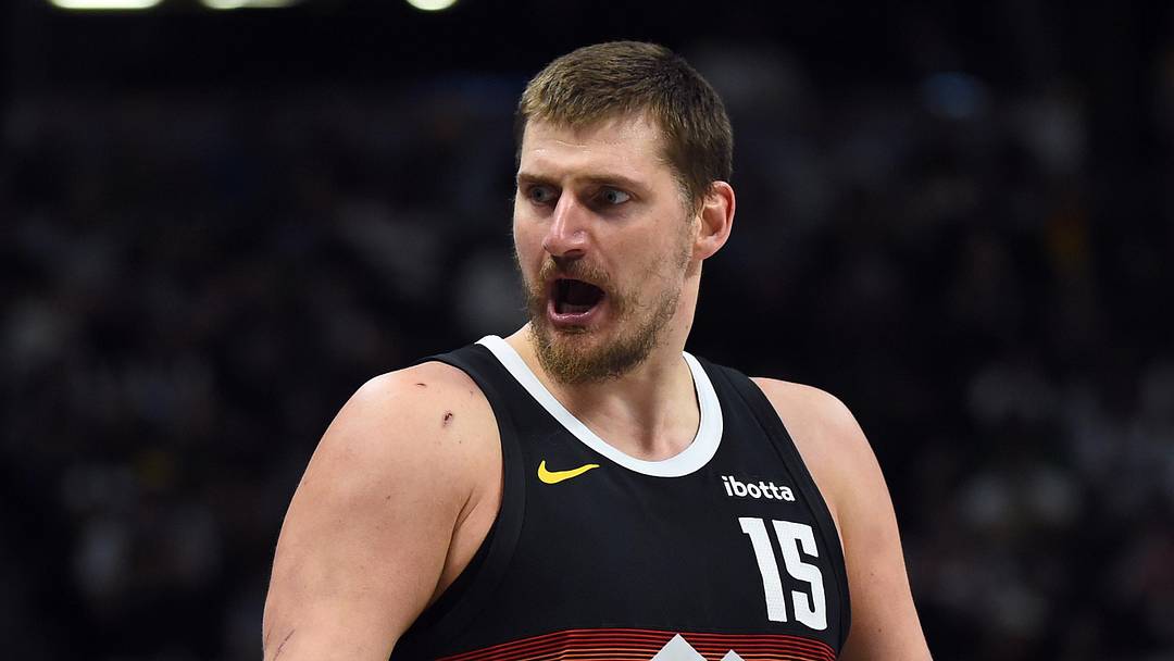 Mar 17, 2026; Denver, Colorado, USA; Denver Nuggets center Nikola Jokic (15) questions an official after a foul during the first half against the Philadelphia 76ers at Ball Arena. Mandatory Credit: Christopher Hanewinckel-Imagn Images