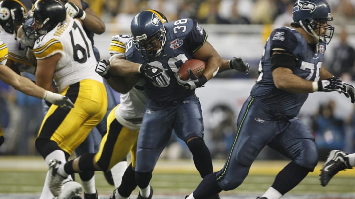 Feb 5, 2006; Detroit, MI, USA; Seattle Seahawks fullback (38) Mack Strong tackled by Pittsburgh Steelers linebacker (53) Clark Haggans in the third quarter of Super Bowl XL at Ford Field. Mandatory Credit: Matthew Emmons-USA TODAY Sports Copyright © 2006 Matthew Emmons