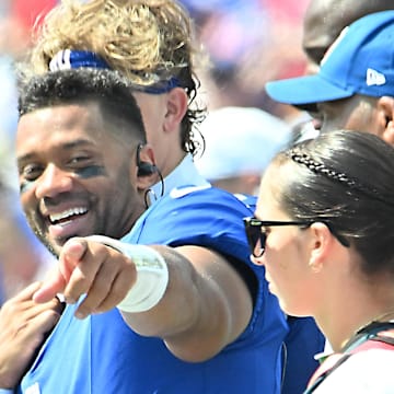 Aug 9, 2025; Orchard Park, New York, USA; New York Giants quarterback Russell Wilson (3) on the sidelines in the third quarter game against the Buffalo Bills at Highmark Stadium.  