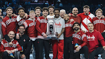 The Nebraska wrestling team poses after taking second at the 2025 NCAA Championships in Philadelphia.