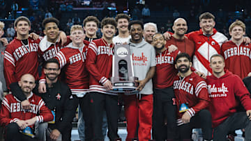 The Nebraska wrestling team poses after taking second at the 2025 NCAA Championships in Philadelphia.