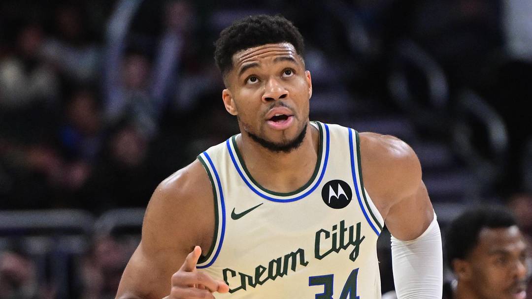 Nov 29, 2025; Milwaukee, Wisconsin, USA; Milwaukee Bucks forward Giannis Antetokounmpo (34) reacts after scoring his 21,000th career point in the third quarter against the Brooklyn Nets at Fiserv Forum. Mandatory Credit: Benny Sieu-Imagn Images