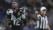 Dec 28, 2024; San Antonio, TX, USA; Colorado Buffaloes wide receiver Travis Hunter (12) reacts after a penalty is called during the second quarter against the Brigham Young Cougars at Alamodome. Mandatory Credit: Troy Taormina-Imagn Images