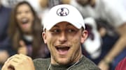 Mar 4, 2017; College Station, TX, USA; Former Texas A&M Aggies quarterback and 2012 Heisman Trophy winner Johnny Manziel watches a game against the Kentucky Wildcats at Reed Arena. Mandatory Credit: Troy Taormina-Imagn Images