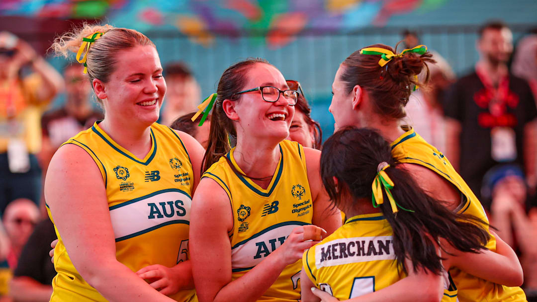 Chloe Symington (left) celebrates with her teammates.