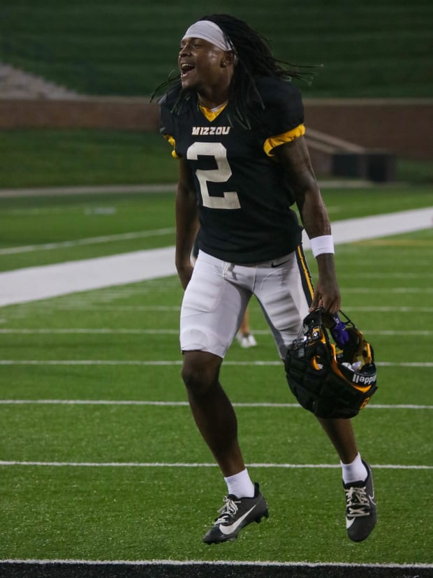 Missouri Tigers wide receiver (2) Marquis Johnson runs off the field after the team's annual fan night practice at Faurot Fie