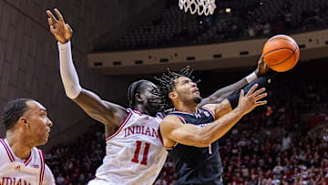Nov 16, 2024; Bloomington, Indiana, USA; South Carolina Gamecocks guard Jacobi Wright (1) shoots the ball while Indiana Hoosiers center Oumar Ballo (11) defends in the second half at Simon Skjodt Assembly Hall. Mandatory Credit: Trevor Ruszkowski-Imagn Images