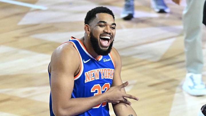 Feb 14, 2026; Los Angeles, CA, USA; Team Knicks guard Jalen Brunson (11) of the New York Knicks and center Karl-Anthony Towns (32) of the New York Knicks react in the shooting stars competition during the 2026 NBA All Star Saturday Night at Intuit Dome. Mandatory Credit: William Liang-Imagn Images