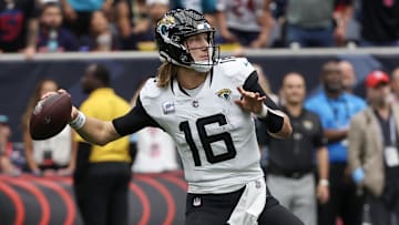 Sep 29, 2024; Houston, Texas, USA; Jacksonville Jaguars quarterback Trevor Lawrence (16) passes against the Jacksonville Jaguars in the second half at NRG Stadium. Mandatory Credit: Thomas Shea-Imagn Images