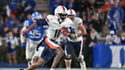 Nov 15, 2025; Durham, North Carolina, USA;  Virginia Cavaliers wide receiver Trell Harris (11) runs the ball during the third quarter against the Duke Blue Devils at Wallace Wade Stadium. Mandatory Credit: Zachary Taft-Imagn Images
