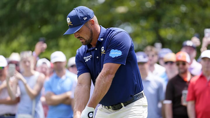Bryson DeChambeau tees off on the third hole during the final round of the PGA Championship golf tournament at Quail Hollow Bryson DeChambeau tees off on the third hole during the final round of the PGA Championship golf tournament at Quail Hollow