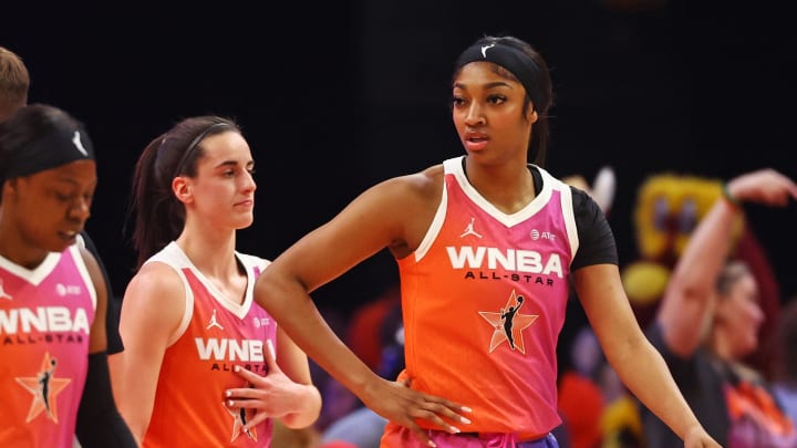 Jul 20, 2024; Phoenix, AZ, USA; Team WNBA forward Angel Reese (5)and Team WNBA guard Caitlin Clark (22) react after a play during the first half against the USA Women's National Team at Footprint Center. Mandatory Credit: Mark J. Rebilas-USA TODAY Sports