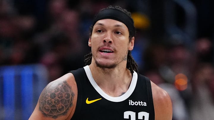 Apr 4, 2026; Denver, Colorado, USA; Denver Nuggets forward Aaron Gordon (32) reacts to his three point score in the second half against the San Antonio Spurs at Ball Arena. Mandatory Credit: Ron Chenoy-Imagn Images