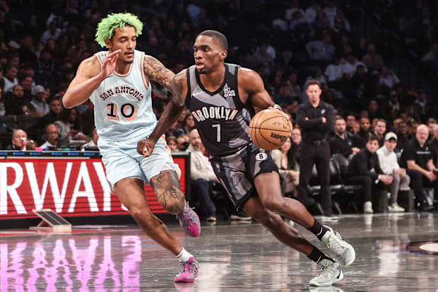 Brooklyn Nets guard Shake Milton (7) drives past San Antonio Spurs forward Jeremy Sochan (10) in the third quarter at Barclay
