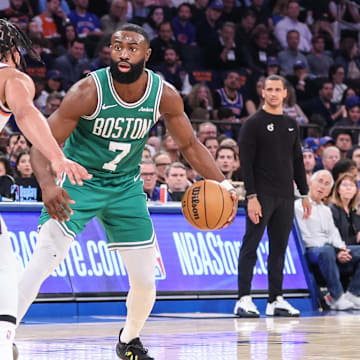 Boston Celtics guard Jaylen Brown looks to drive past New York Knicks guard Jalen Brunson. Mandatory Credit: Wendell Cruz-Imagn Images
