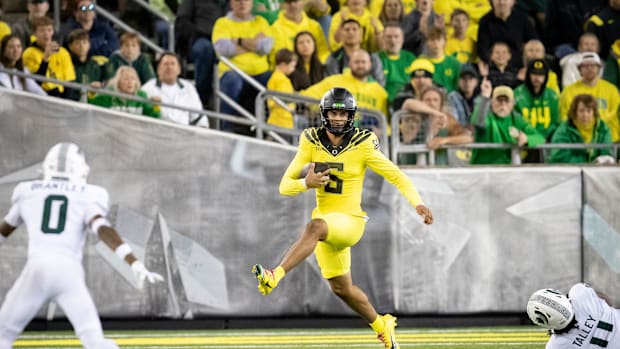 Oregon Ducks quarterback Dante Moore runs the ball as the Ducks host the Spartans Friday, Oct. 4, 2024 at Autzen Stadium in E